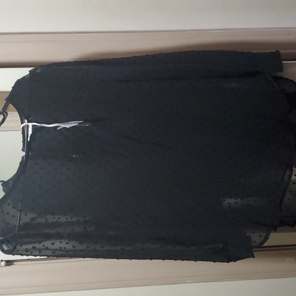 Revamped black Polk dot sheer scoop neck top.